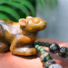 Peacock tail and glass beads necklace with a handcrafted jade mouse pendant