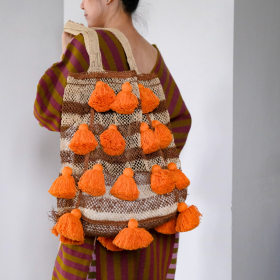 Jungle vine pom pom bag, brown stripe with orange pom pom